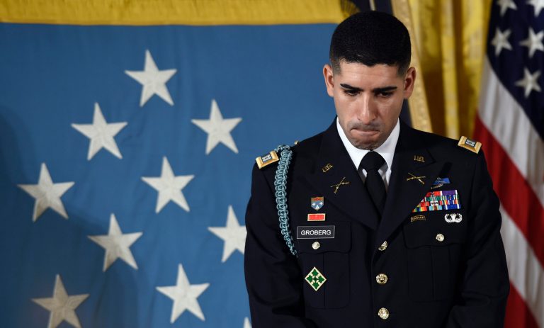 In Afghanistan in August 2012, Florent Groberg was serving as a personal security detachment commander when he spotted a man walking erratically toward a group of other soldiers on foot. (AP Photo)