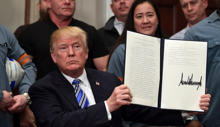 President Trump's proclamation will apply a 25 percent tariff to most steel imports and a 10 percent tariff to most aluminum imports. (AP Photo/Susan Walsh)