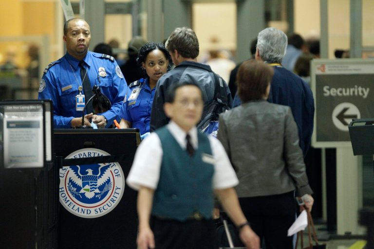 FILE - In this Thursday, Nov. 18, 2010 file photo, TSA officials check check passengers entering a security checkpoint at Hartsfield-Jackson Atlanta International Airport in Atlanta. A federal probe of a Transportation Security Administration program to screen suspicious behavior of passengers at airports suggests the effort, which has cost almost $1 billion since 2007, has not been proven effective, according to a report released Wednesday, Nov. 13, 2013. (AP Photo/David Goldman, File)