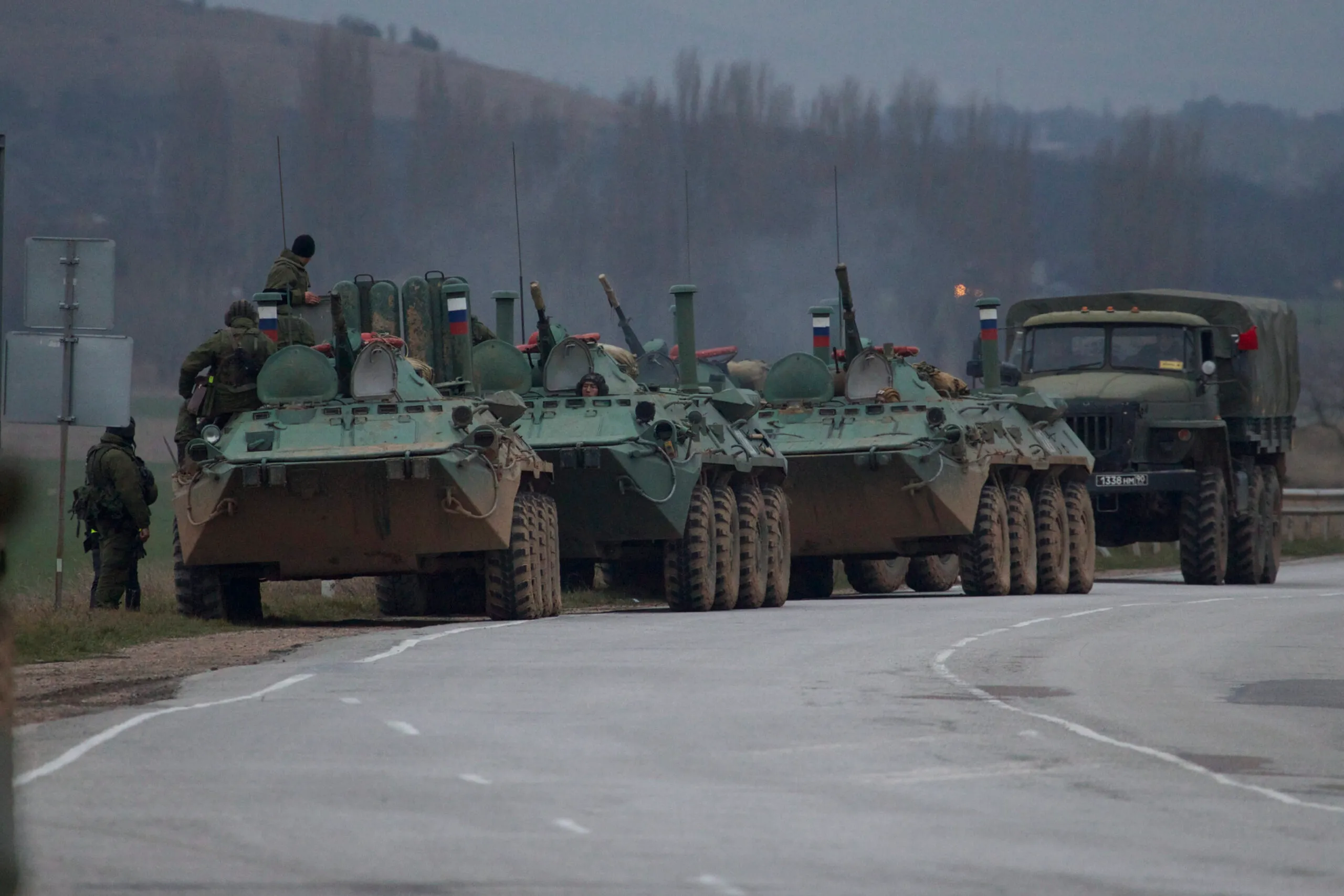 Ukraine says Russia tries to seize airports, base