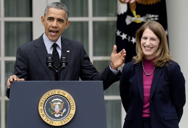 President Obama stands with his nominee to become Health and Human Services secretary, OMB Director Sylvia Mathews Burwell, while speaking in the Rose Garden of the White House in Washington on Friday. (AP Photo/Susan Walsh)