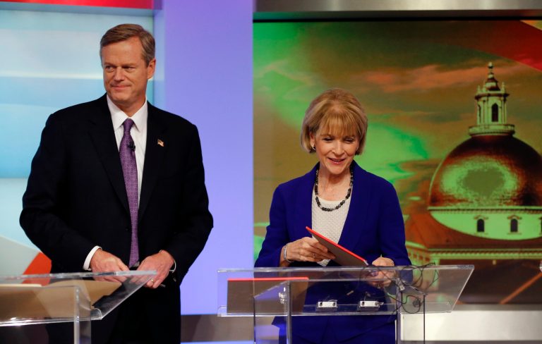 Massachusetts gubernatorial candidates, Republican Charlie Baker and Democrat Martha Coakley, prepare at WBZ-TV studios in Boston, Tuesday, Oct. 7, 2014 just prior to a televised debate. (AP Photo/Elise Amendola)