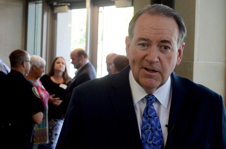 Republican presidential candidate and former Arkansas Gov. Mike Huckabee speaks with reporters before a fundraising lunch at the El Dorado Conference Center in El Dorado, Ark., Thursday, June 4, 2015. (Quentin Winstine/News-Times via AP)
