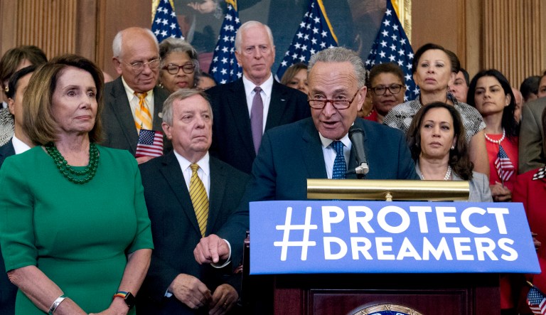 The White House came out firmly against a plan earlier this month to fold a legislative fix for undocumented youth into Congress' year-end appropriations bill. Senate Minority Leader Chuck Schumer, D-N.Y., and House Democratic Leader Nancy Pelosi, D-Calif., plan to continue pushing for a DACA fix in the upcoming spending bill, knowing that Senate Republicans will need the votes of at least eight Democrats to ensure its passage. But if no deal is reached by Dec. 8, both parties will face a government shutdown. ( AP Photo/Jose Luis Magana)