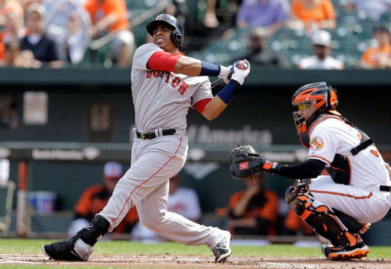 Boston Red Sox's Yoenis Cespedes reacts as he takes a swinging strike in a baseball game against the Baltimore Orioles in Baltimore. (AP Photo/Patrick Semansky)