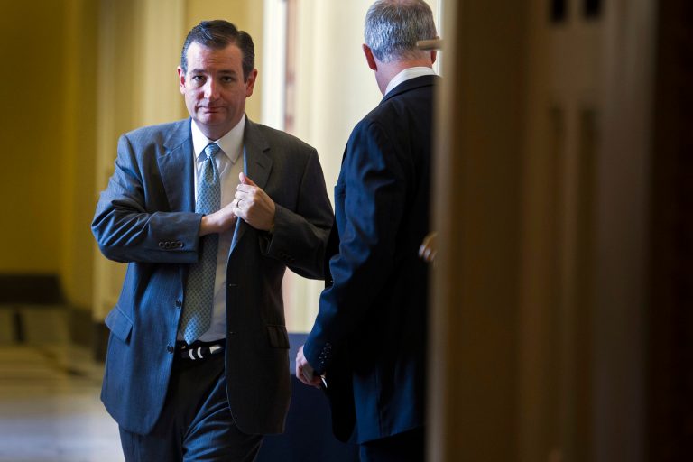 Sen. Ted Cruz, R-Texas, leaves a policy luncheon at the U.S. Capitol in Washington, Tuesday, June 23, 2015. (AP Photo/Cliff Owen)