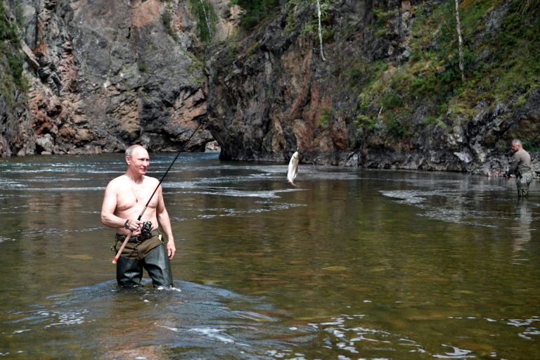 Shirtless photos of the Russian president released by Russian state television shows Putin fishing with a rod, underwater fishing with a spear gun, and driving a boat through a lake while accompanied by Defense Minister Sergei Shoigu and other Russian officials, according to the Associated Press. (Alexei Nikolsky/Sputnik, Kremlin Pool Photo via AP)