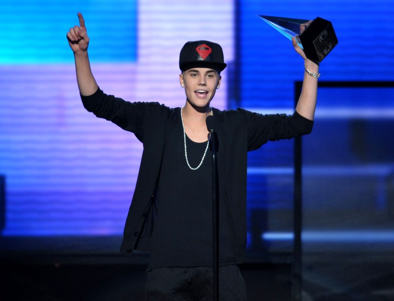   FILE - In this Nov. 18, 2012 file photo, Justin Bieber accepts the award for favorite album - pop/rock for 