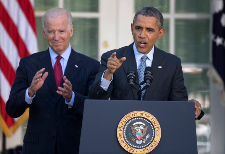 President Obama, with Vice President Joe Biden, gestures as he speaks in the Rose Garden of the White House in Washington, Tuesday, April 1. (AP/Carolyn Kaster)