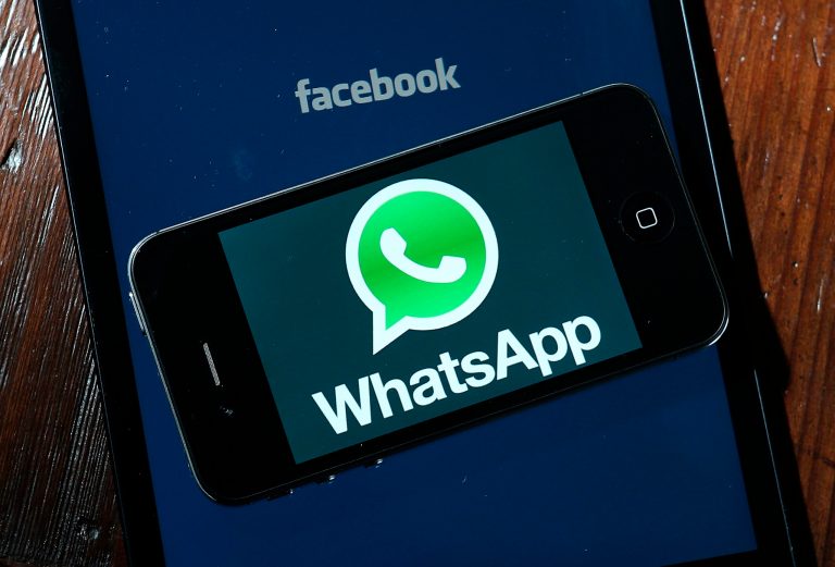 Facebook and WhatsApp logos are displayed on portable electronic devices. (Justin Sullivan/Getty Images)