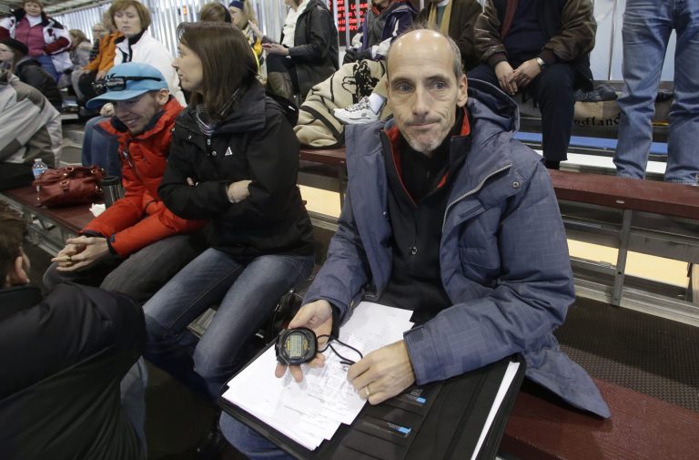  U.S. national short track coach Guy Tibault sits in the stands during the U.S. short track speedskating championships, Friday, Dec. 21, 2012, at the Utah Olympic Oval in Kearns, Utah. (AP Photo/Rick Bowmer)  