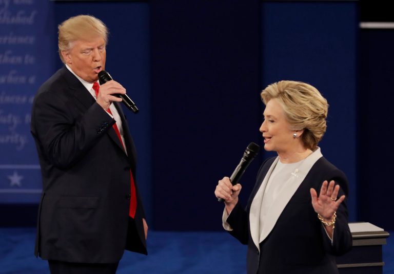 Republican presidential nominee Donald Trump and Democratic presidential nominee Hillary Clinton speak during the second presidential debate at Washington University in St. Louis, Sunday, Oct. 9, 2016. (AP Photo/Patrick Semansky)