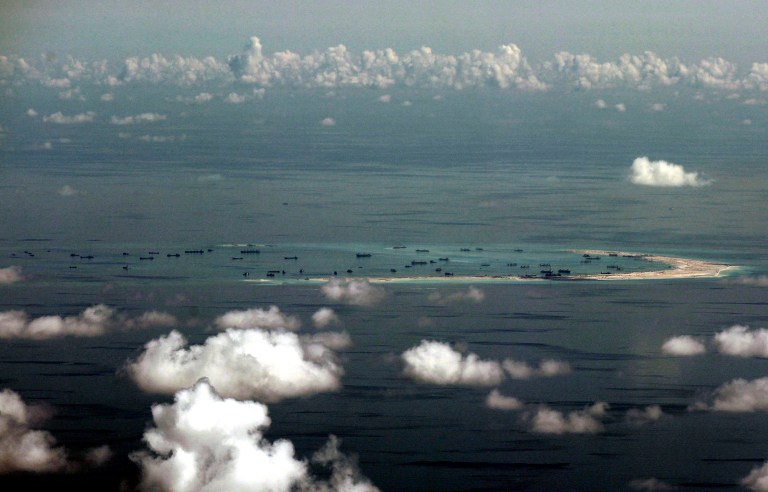 Images of the Spratly Islands reveal Vietnam has dumped more than 120 acres of fresh land onto smaller islands in the past two years. (Ritchie B. Tongo/Pool Photo via AP, File)