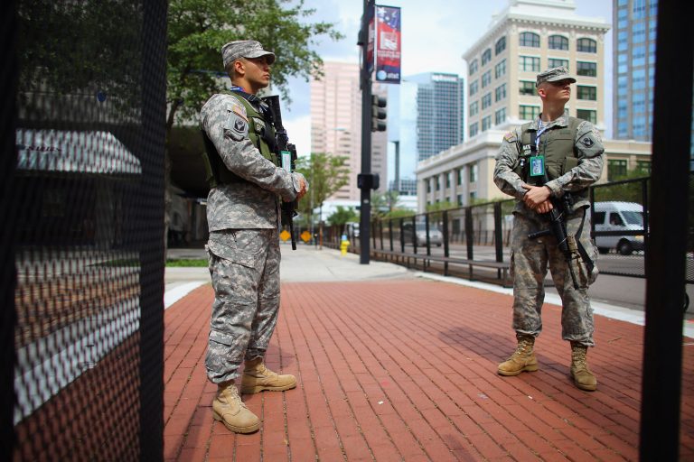 Florida National Guard members are seen guarding a building as they provide security for the Republican National Convention being held at the Tampa Bay Times Forum on August 25, 2012 in Tampa, Florida. (Photo by Joe Raedle/Getty Images)