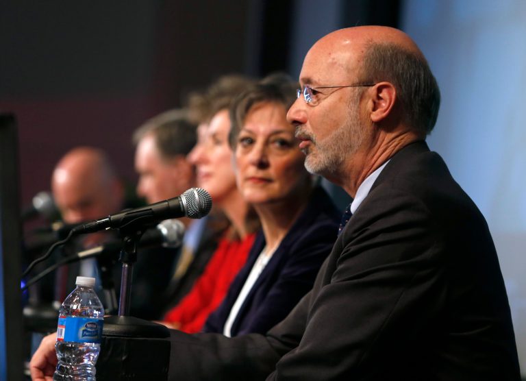York businessman Tom Wolf speaks during a gubernatorial candidates forum on Feb. 4 in Philadelphia, with his opponents in the Democratic primary in the background.ÃÂ Wolf's major TV ad buy across the state has given him a boost in the polls, according to a new Franklin & Marshall College poll released Wednesday.ÃÂ (AP Photo/Jacqueline Larma)