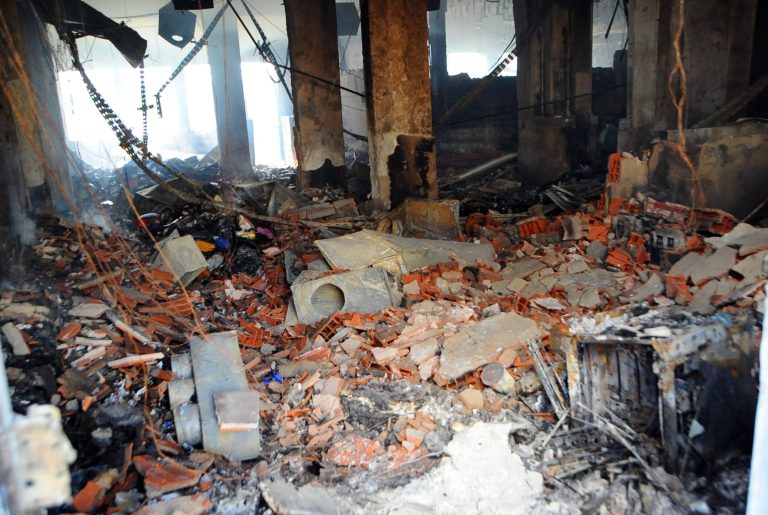 View of burned American school adjacent to the U.S. embassy compound in Tunis, Tunisia, Saturday, Sept. 15, 2012, a day after several thousand demonstrators angry over a film that insults the Prophet Muhammad stormed the compound. Tunisia's governing moderate Islamist party condemned the attacks, saying Saturday that such violence threatens the country's progress toward democracy after decades of dictatorship. (AP Photo/Hassene Dridi)