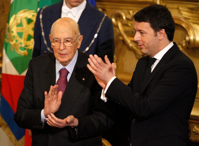 Italian President Giorgio Napolitano, left, and Premier Matteo Renzi, applaud at the end of a swearing in ceremony of the new government at the Quirinale Presidential Palace, in Rome, Saturday, Feb. 22, 2014. Renzi has been sworn in as Italy's youngest premier, heading a new government he says promises will swiftly tackle old problems. (AP Photo/Andrew Medichini)