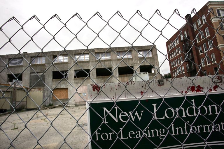 Blighted property lies June 27, 2005 in downtown New London, Connecticut.Â Today, the land that was once the Fort Trumbull neighborhood of New London, Conn., is a field of rubble. The brilliant plans of the powerful planners failed. They had torn down a neighborhood to make it nicer for a new Pfizer plant. Pfizer left the plant a few years later. Nothing has taken the place of Fort Trumbull.Â (Photo by Spencer Platt/Getty Images)