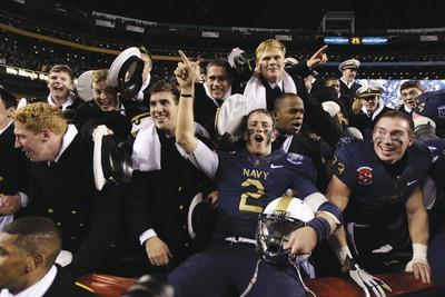 Rob Carr/Getty Images
Navy defeated Army in the 112th edition of one of themost storied rivalries in sports.