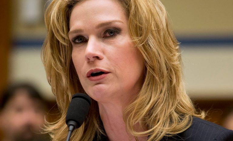 Catherine Engelbrecht testifies on Capitol Hill in Washington, Thursday, Feb. 6, 2014, before the House subcommittee on Economic Growth, Job Creation hearing to investigate the Justice Department's investigation into the IRS abuse scandal. (AP Photo/Pablo Martinez Monsivais)