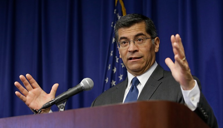 California Attorney General Xavier Becerra at a news conference Thursday warned employers that they must comply with a new California law that limits their cooperation with immigration officials. (AP Photo/Rich Pedroncelli)
