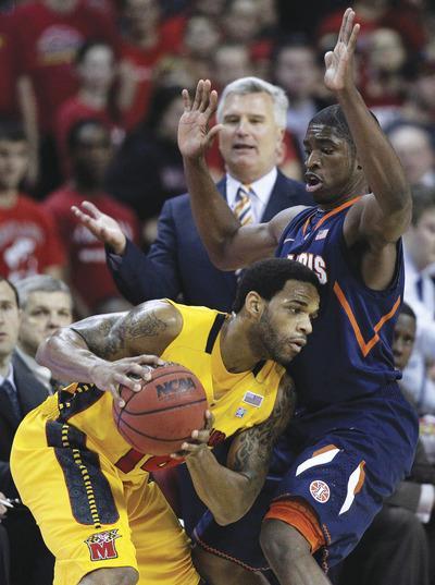 Patrick Semansky/AP
Sean Mosley, left, finished with five points as Maryland suffered their first home loss in seven ACC-Big Ten Challenge games.