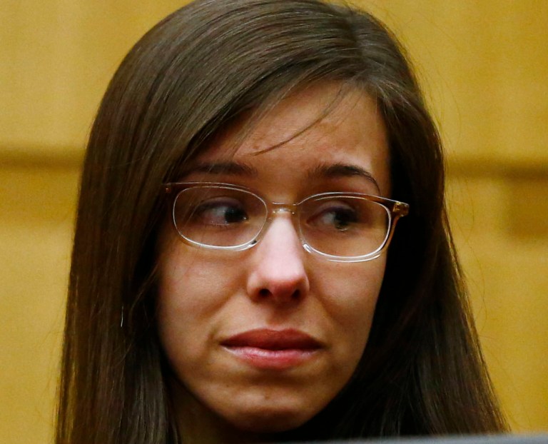 Jodi Arias looks at her family after being found of guilty of first-degree murder in the gruesome killing of her one-time boyfriend, Travis Alexander, in their suburban Phoenix home, Wednesday, May 8, 2013, in Phoenix. (AP Photo/The Arizona Republic, Rob Schumacher, Pool)