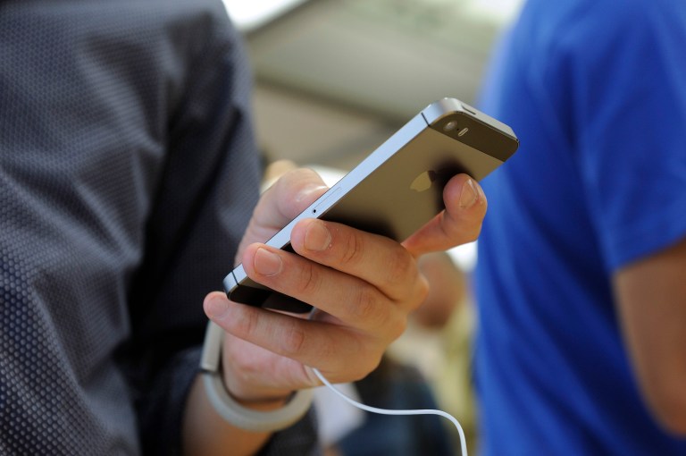 The iPhone 5c, which had been used by the perpetrators of December's terrorist attack in California, served as the focal point of national controversy for more than a month. (Akio Kon/Bloomberg)