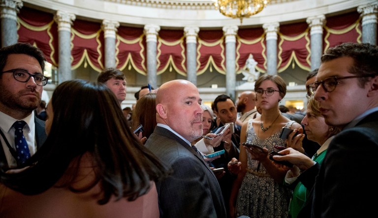 Rep. Tom MacArthur, R-N.J., center, pauses while speaking to members of the media off the House Chamber on Capitol Hill in Washington. (AP Photo/Andrew Harnik)
