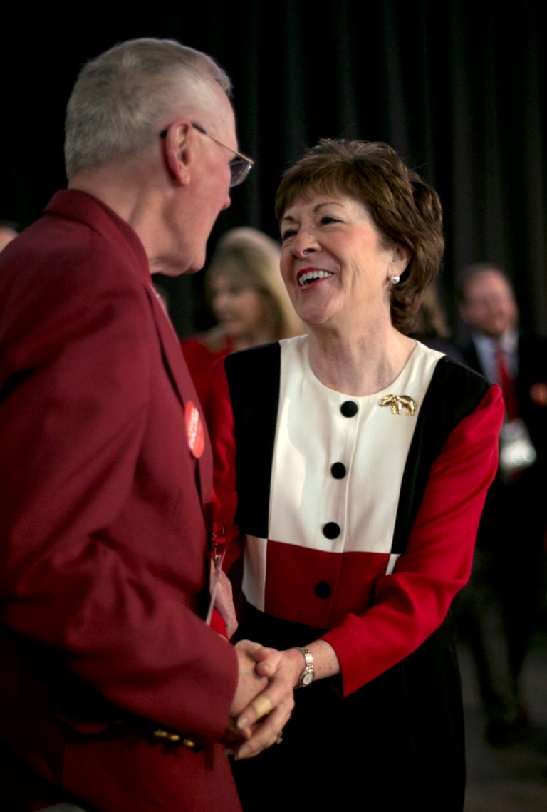 Sen. Susan Collins, R-Maine, greets Michael Timmons of Cumberland, Maine, after speaking at the Maine Republican Convention, Saturday, April 26, 2014, in Bangor, Maine. (AP Photo/Robert F. Bukaty)