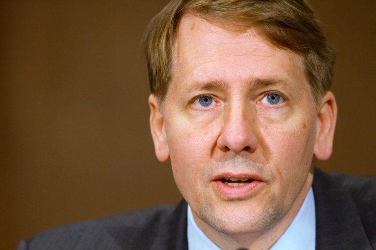 Army Veteran and CFPB employee Angela Martin claims Director Richard Cordray, above, asked her to 'back down' in exchange for help securing her a new position. (AP Photo)