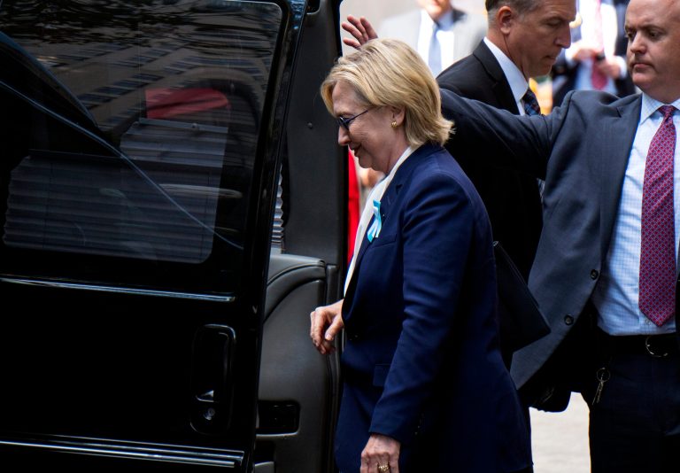 Democratic presidential candidate Hillary Clinton walks from her daughter Chelsea's apartment building Sunday, Sept. 11, 2016, in New York. (AP Photo/Craig Ruttle)