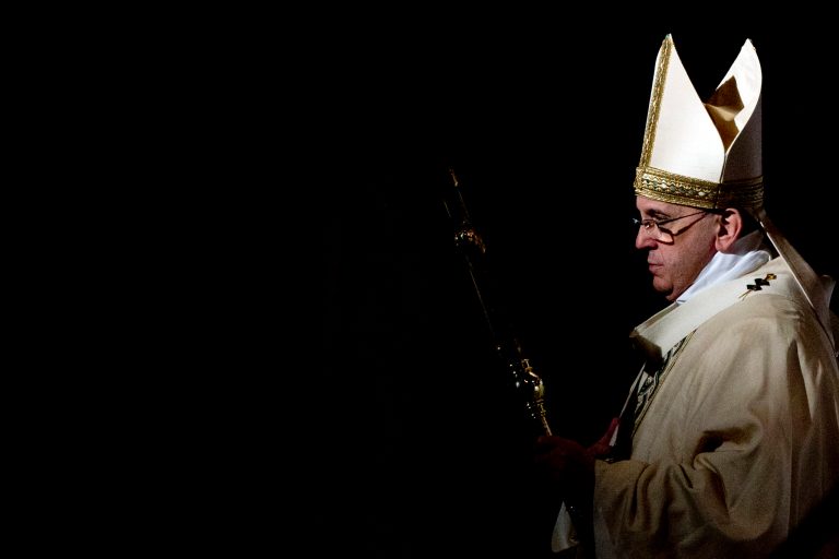 Pope Francis leaves after celebrating a Mass in St. Peter's Basilica, at the Vatican, to mark Epiphany. (AP/Andrew Medichini)