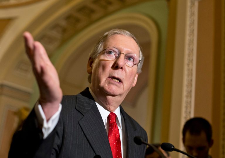 Senate Minority Leader Mitch McConnell gestures as he speaks with reporters on Capitol Hill in Washington on July 9. (AP Photo/J. Scott Applewhite, File)