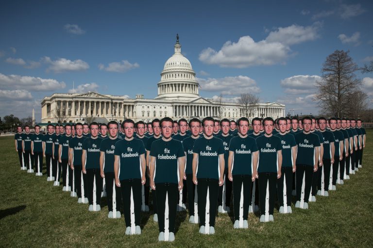 Advocacy group rolls out army of fake Mark Zuckerbergs on the Capitol Lawn ahead of Senate hearing
