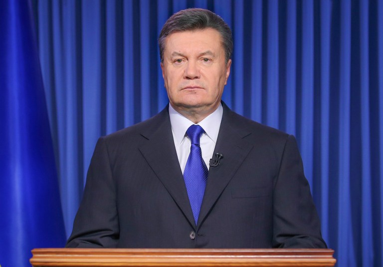 File- This Feb. 19, 2014, file photo shows Ukrainian President Viktor Yanukovych addressing the nation on a live TV broadcast in Kiev, Ukraine. The fugitive president said in a statement published by three Russian news agencies that he is asking Russia's protection from 