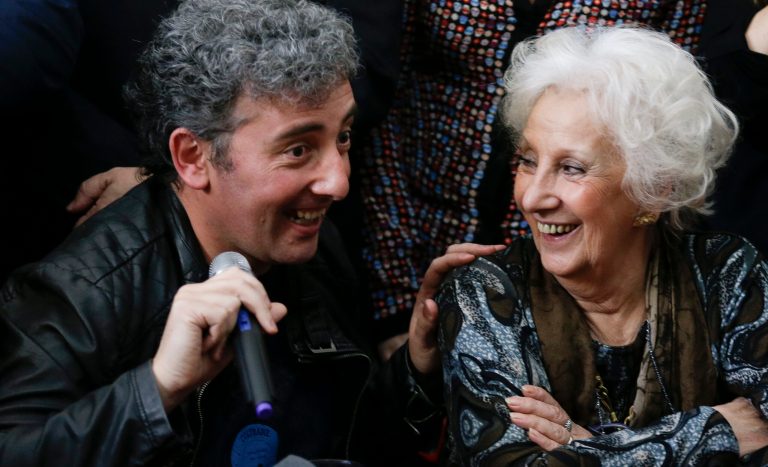 Estela de Carlotto, president of Grandmothers of Plaza de Mayo, right, and her grandson Ignacio Hurban hold a news conference in Buenos Aires, Argentina, Friday, Aug. 8, 2014. A provincial music teacher in Argentina, Hurban, is making his first public appearance since he was dramatically identified as the long-sought grandson of the country's leading human rights activist, Estela de Carlotto. The activist spent 36 years searching for the child taken from her daughter, who was executed by the military during the country's military dictatorship. (AP Photo/Natacha Pisarenko)