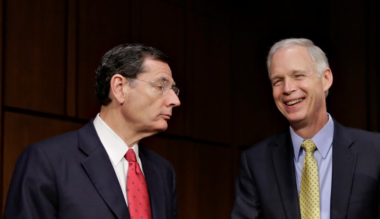 Republican Sens. John Barrasso of Wyoming and Ron Johnson of Wisconsin are dismissing rumors that they are interested in becoming the next secretary of Health and Human Services. (AP Photo/J. Scott Applewhite)