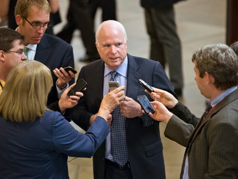 Sen. John McCain, R-Ariz., said senators would discuss a compromise proposal that could defuse the situation, and that the compromise had already received the support of a number of senators.  (AP Photo/J. Scott Applewhite)