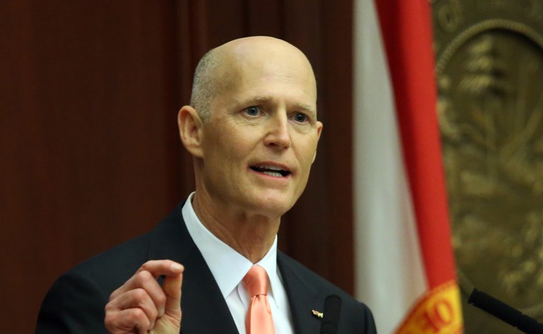 Florida Gov. Rick Scott will meet with Donald Trump on Monday at the New York businessman's Manhattan office. (AP Photo/Steve Cannon)