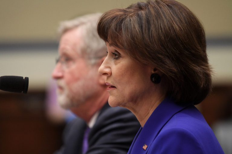 Former Internal Revenue Service (IRS) official Lois Lerner, accompanied by her attorney is seen on Capitol Hill in Washington, Wednesday, March 5, 2014, during the House Oversight and Government Reform Committee hearing on the the agency's targeting of Tea Party groups, where she invoked her constitutional right not to incriminate herself. (AP Photo/Lauren Victoria Burke)