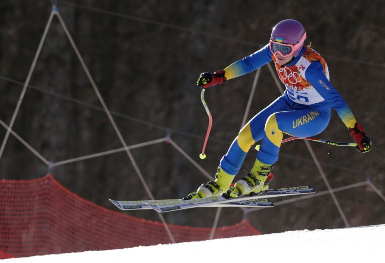 In this Saturday, Feb. 15, 2014 photo, Ukraine's Bogdana Matsotska makes a jump in the women's super-G at the Sochi 2014 Winter Olympics in Krasnaya Polyana, Russia. The International Olympic Committee said on Thursday, Feb. 20, that Matsotska has left the Olympics in response to the violence in her country. (AP Photo/Charles Krupa)