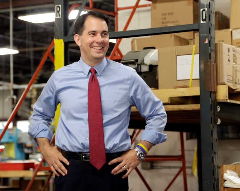 A recent Marquette poll indicates that Gov. Walker has plenty to smile about. (AP/Darren Hauck)