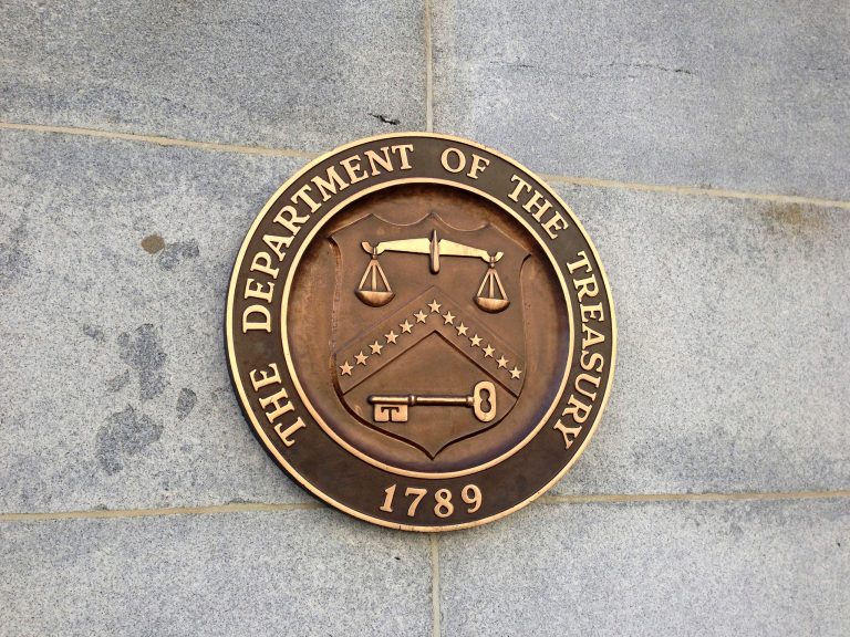 The Treasury Department reported Monday that the federal government ran a $107 billion surplus in April, the month in which individual income tax returns were due. (AP Photo/Jon Elswick)