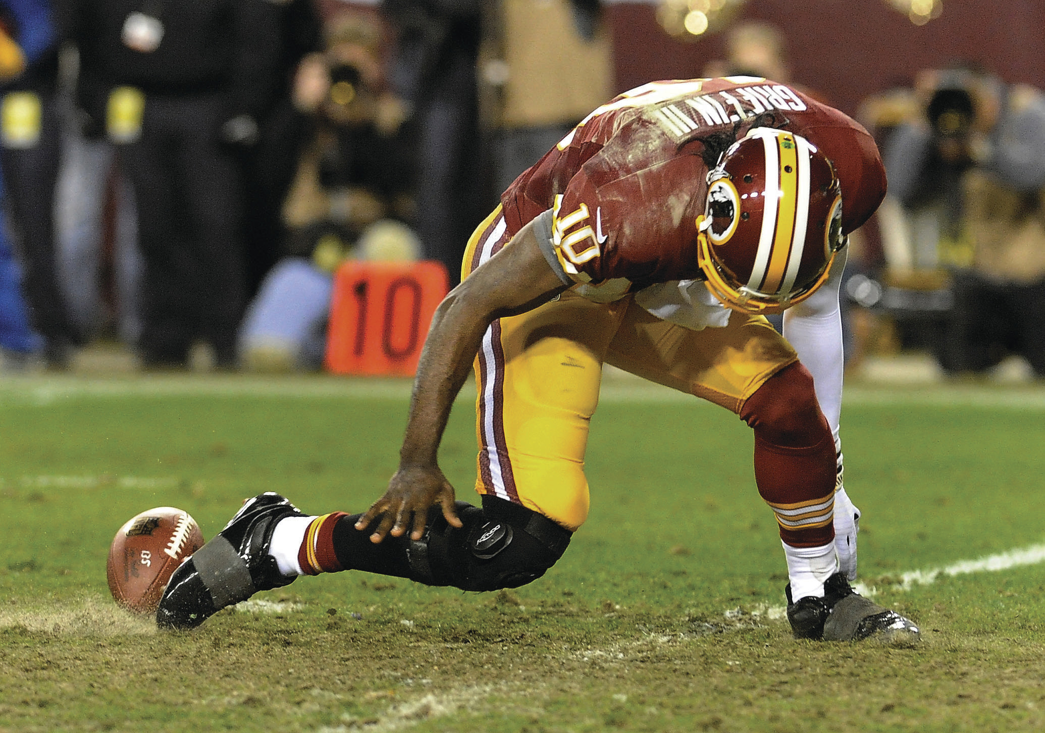 Despite injury, RGIII shows off what he can do at Redskins OTAs