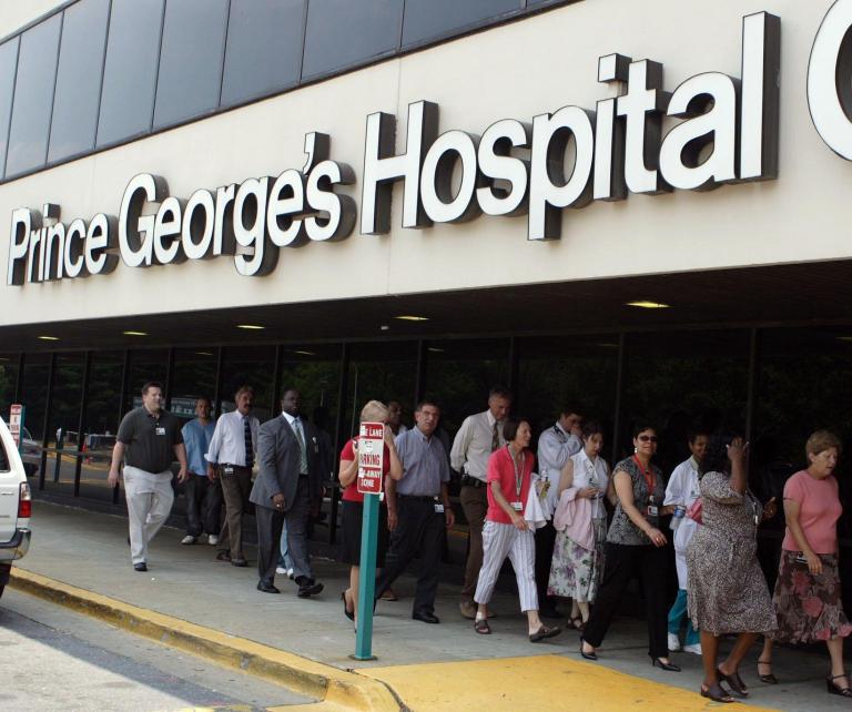 Workers at Prince George's Hospital Center in Cheverly Maryland return to the job after attending a May 2010 press conference about the future of their hospital which faces closure in a fight over money with the county government. (File photo/Michael Riccio/ for the Examiner)