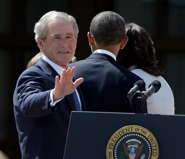 FILE - In this April 25, 2013, file photo former President George W. Bush turns to wave as he leaves with President Barack Obama and first lady Michelle Obama after the dedication of the George W. Bush Presidential Center in Dallas. Bush has successfully undergone a heart procedure after doctors discovered a blockage in an artery. (AP Photo/LM Otero, File)