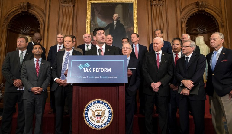 The Republicans have argued that the bill's tax cuts should be judged separately from the effects of zeroing out the Obamacare individual mandate for people to buy health insurance. (AP Photo/J. Scott Applewhite)