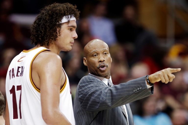   Cleveland Cavaliers head coach Byron Scott, right, instructs Anderson Varejao, of Brazil, in the first half of an NBA basketball game against the Toronto Raptors, Tuesday, Dec. 18, 2012, in Cleveland. Toronto won 113-99. (AP Photo/Mark Duncan)  