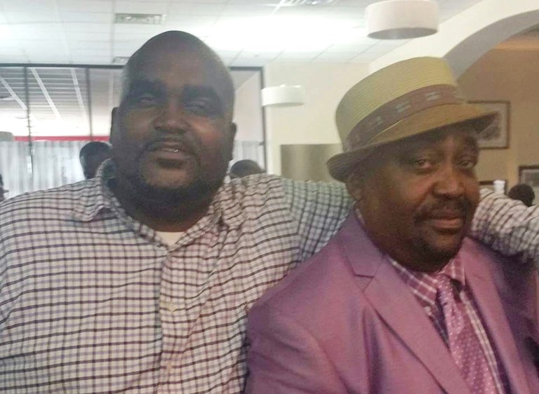 Terence Crutcher, left, with his father, Joey Crutcher. Crutcher, an unarmed black man was killed by a white Oklahoma officer Friday, who was responding to a stalled vehicle. (Courtesy of Crutcher Family/Parks and Crump, LLC via AP)